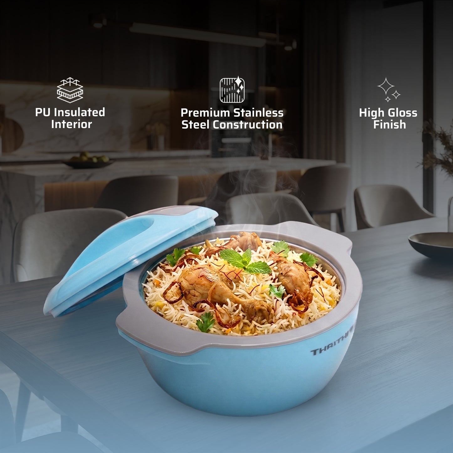 A light blue and gray ThermoFast insulated rice cooker pot filled with rice and chicken, shown on a dining table with a blurred kitchen background. White text callouts highlight features: PU Insulated Interior, Premium Stainless Steel Construction, and High Gloss Finish.